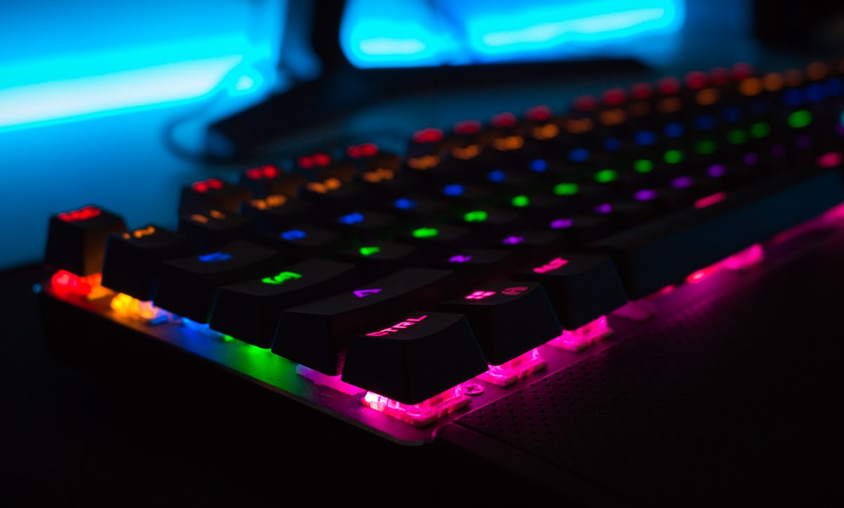 Neon-lit gaming keyboard and accessories