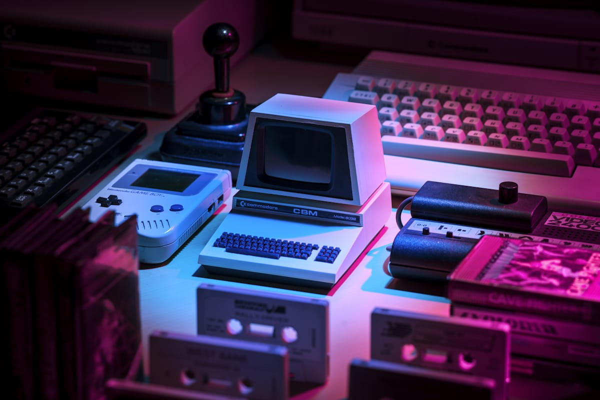 Retro arcade cabinet lights in a dark room